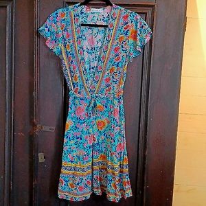 R. Vivimos Flower print wrap around dress with ruffled hem and sleeves Large